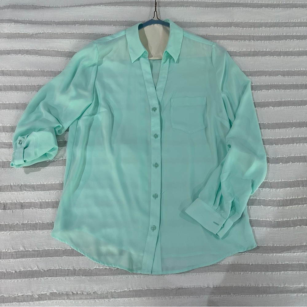 Women’s lightweight blue button up.